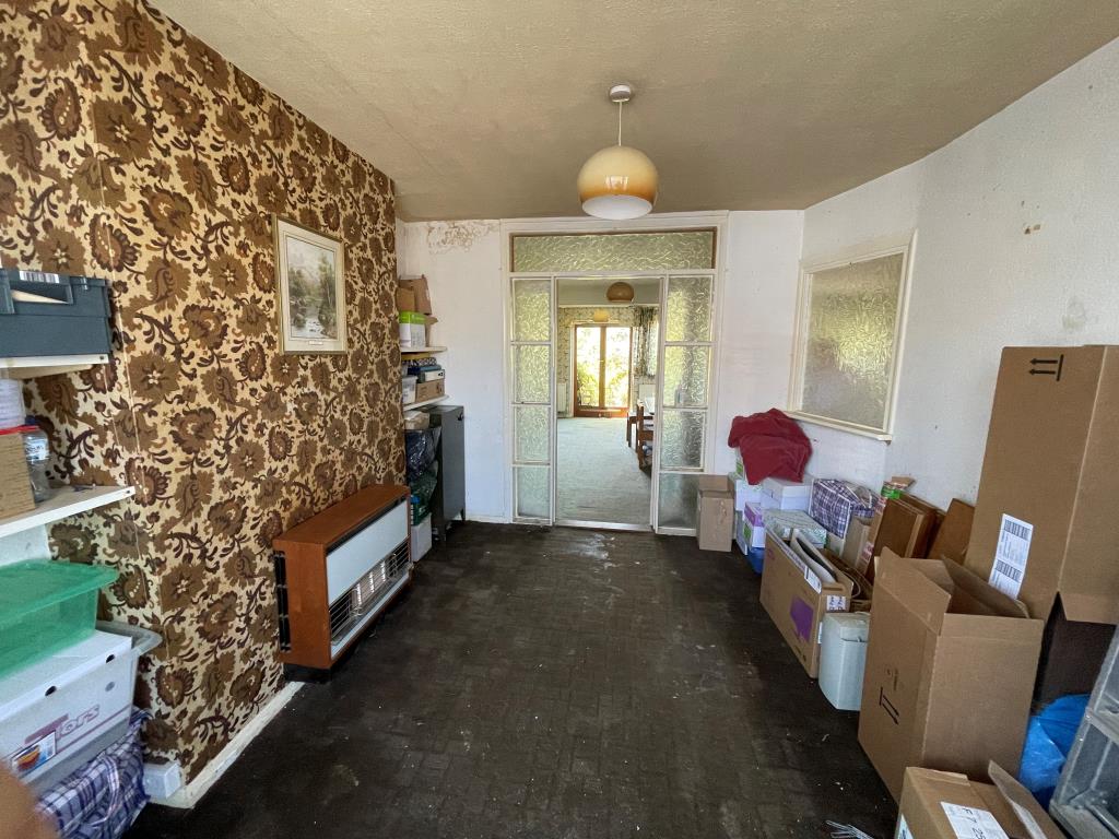 Lot: 18 - THREE-BEDROOM HOUSE FOR IMPROVEMENT - Living room looking through to dining room